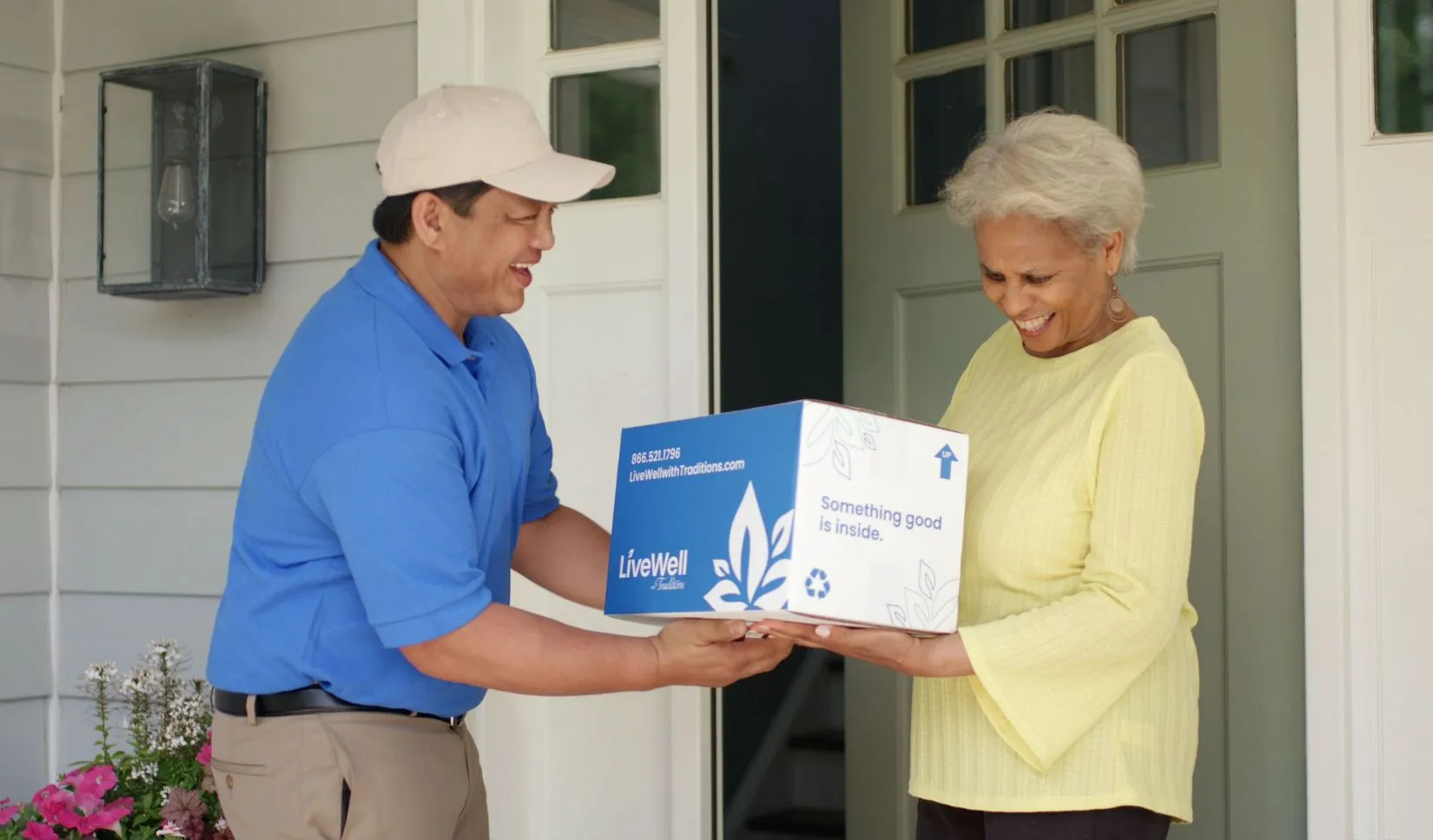 elderly woman receiving LiveWell package