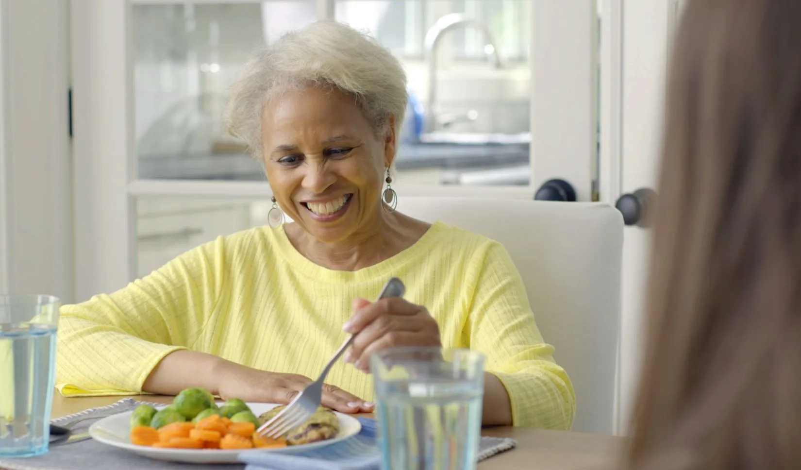 elderly woman eating