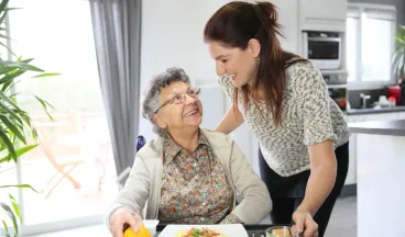 caregiver and elderly woman