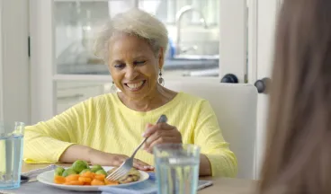 elderly woman eating