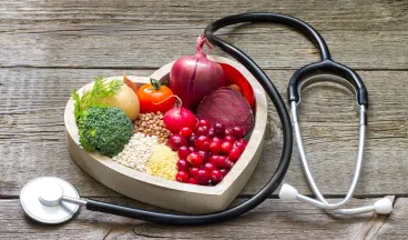 vegetables in a heartshaped blood pressure monitor 