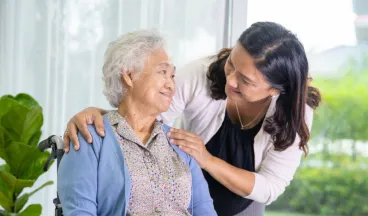 caregiver with elderly woman