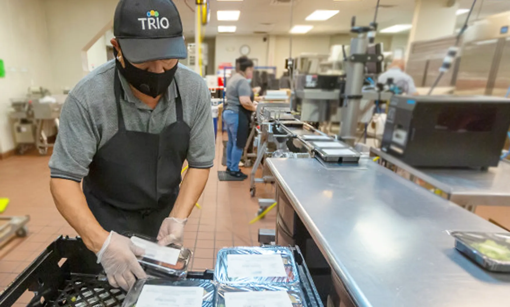 trio team in the kitchen