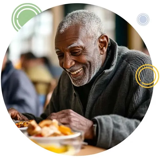 a senior man eating