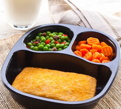 Breaded Pollock with carrots and mixed peas