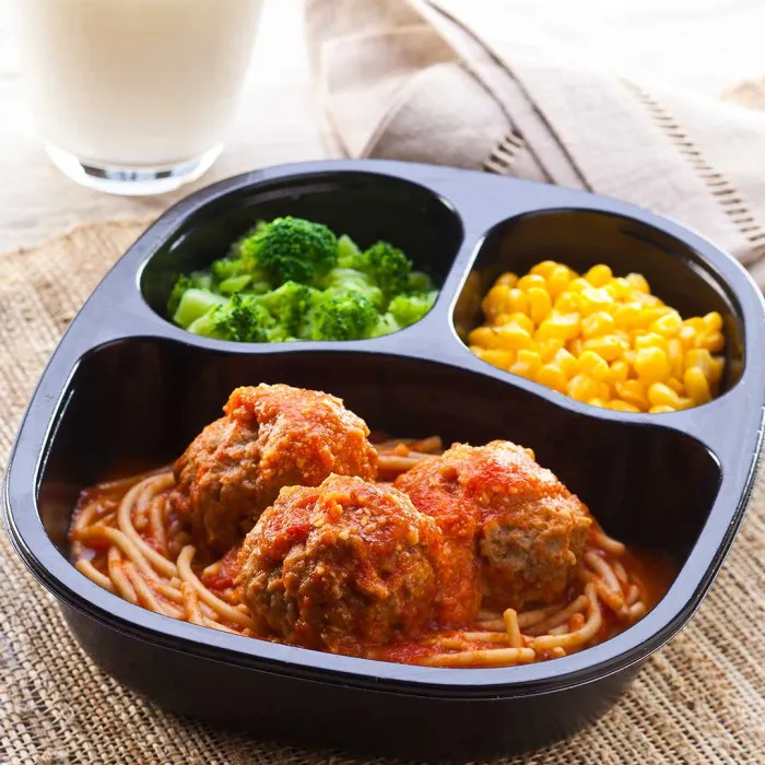 Spaghetti & Meatballs with Whole Kernel Corn & Broccoli Florets | a frozen meal solutions from Traditions