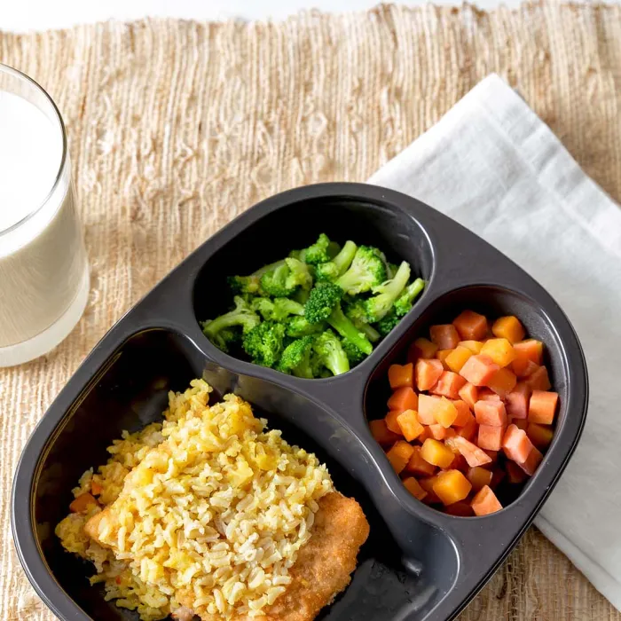 Breaded Pollock with Coconut Curry Rice served with Three Seasons Blend & Broccoli Florets