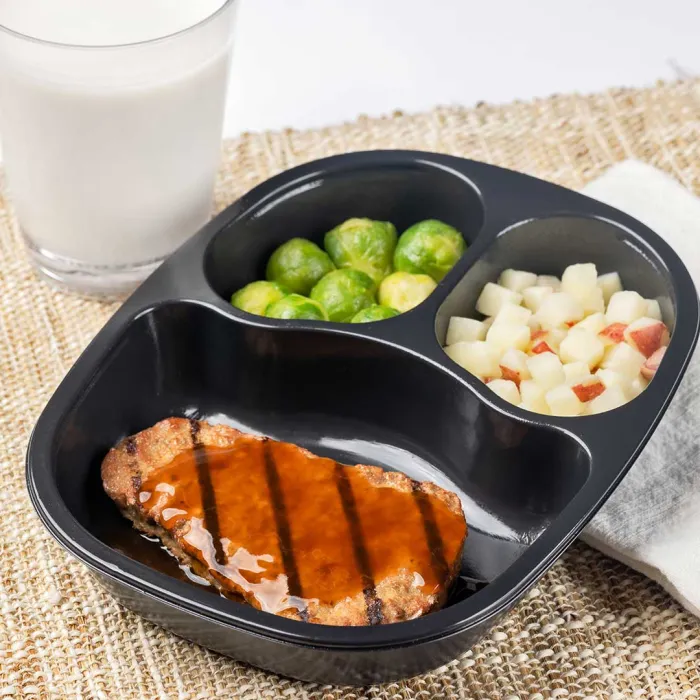 NY Strip Shaped Beef Patty with Horseradish Sauce served with Red Skin Potatoes and Brussels Sprouts