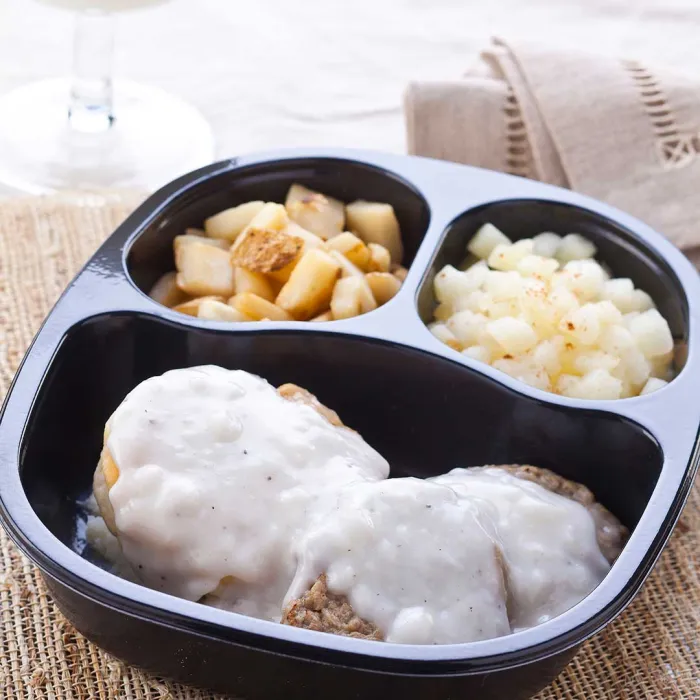 Sausage Patties and Biscuit with Country Gravy served with Cinnamon Apples & Hash Browns